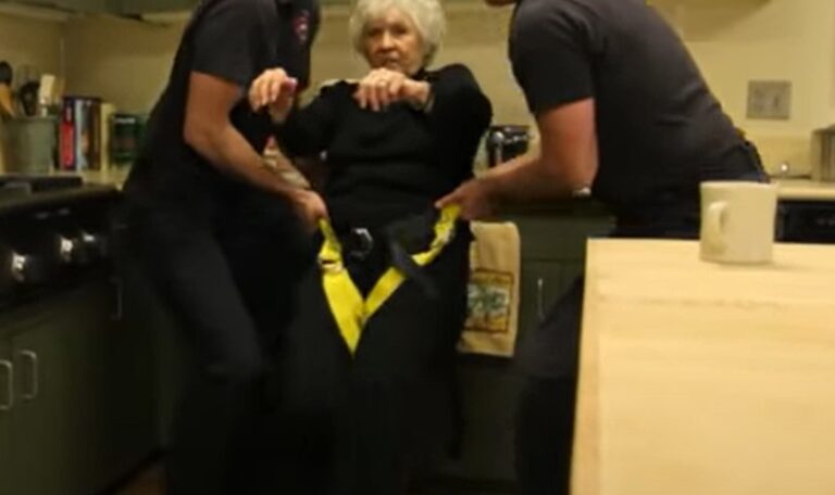 emts-helping-woman-up